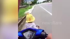 Parents spark outrage after riding motorcycle with toddler in the basket