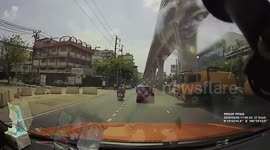 Motorcycle rider and passenger crash while weaving between traffic