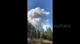 Huge cloud of smoke rises from 