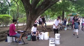 Drums made with buckets at Ibirapuera Park, Sao Paulo, Brazil.