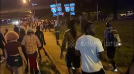 After shutting down the highway protesters  are blocked from the entrance ramp in Atlanta, USA