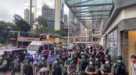 People gathered at Admiralty on Monday evening to mark one year since the death of an anti-extradition protester there