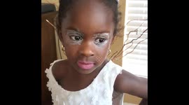 Little girl tries on sister's makeup and the result is adorable