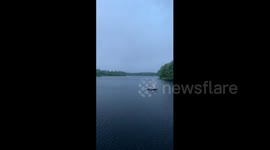 Family run as 'microburst' wind storm blows through Canada lake