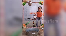 This Chinese electrician is back with more incredible balancing skills