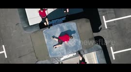 Acrobats perform gymnastics on the world's biggest metal nut