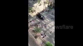 Hundreds of Juneteenth protestors gather for a sit-in in the middle of Toronto streets, Canada