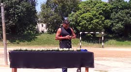 Man in India famous as a hammer head man made world record in past breaking 51 wood apple from his head in 2.5 Minutes