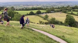 Hundreds Gather at Glastonbury Tor For Summer Solstice Celebrations Despite Social Distancing Restrictions Still in Place