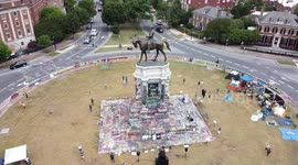 Armed off-duty cop arrested outside occupied Robert E Lee monument in Virginia