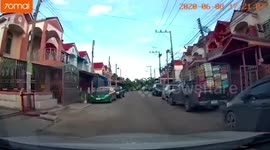 Heart-stopping moment girl rides push bike in front of oncoming car