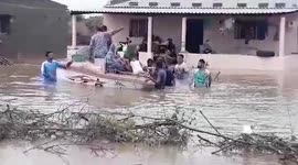 Stranded villagers rescued after check dam overflows in western India