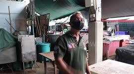 Snake causes chaos after slithering through market in Thailand