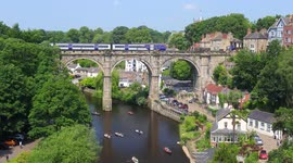 Tourists flock to a picturesque town in Yorkshire to enjoy boat rides on the River Nidd