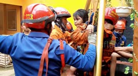 Firefighters rescue two children, one adult from well in Indonesia