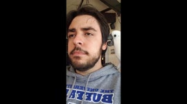 Cockatoo licking his favorite human's ear