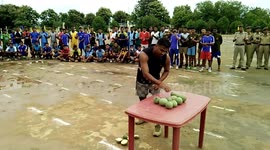 Man in India famous as a hammer head man made world record in past breaking 25 wood apple from his head in 2.5 Minutes