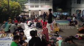Street singers of the Black Pink dance in the Old City