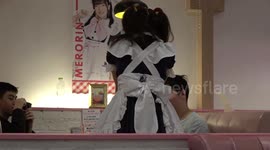 Japanese maid restaurant has cardboard cut outs and masks dusring pandemic
