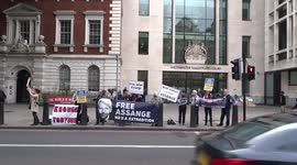 Supporters of Julian Assange congregate outside