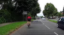 Disgusting cyclist spits and sprays snot from nose at road user