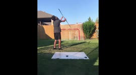 Kid does impressive hockey trickshot