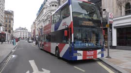 London bus tours begin again, but tourists are thin on the ground