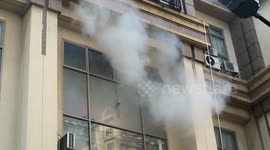 Firefighter rescue woman trapped in building on fire in Jakarta, Indonesia