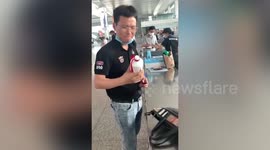 Man downs bottle of Chinese liquor after not being allowed to take it on train