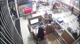 Cashier appears unfazed as motorcycle crashes into Indonesian cafe