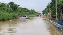 Mother and son rescued from Mercedes swept away by flash flood in Thailand