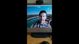 Vicar in zoom meeting on a rollercoaster