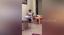 Toddler pretends to be pastor at home in United Arab Emirates