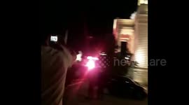 Demonstrators with firecrackers and torches storm Serbian Parliament in Belgrade