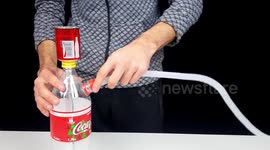 Vlogger shows how to make a homemade hookah pipe from plastic bottle