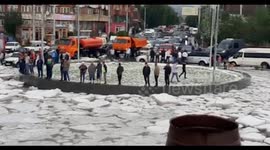 Cars submerged under icy floodwater as hail storm hits Armenia