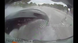 Intense moment in Florida when Tesla bumper falls off while it rains