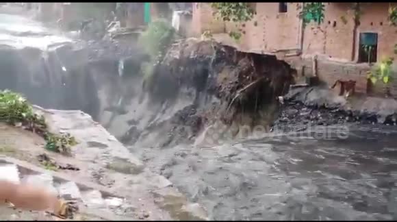 Two-story building comes crashing down after heavy rain lashes Indian capital