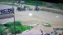 Four motorcycles crash on the road in India