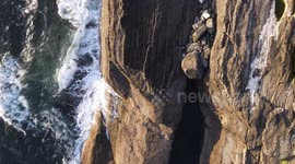 Aerial view of a cliff located in Asturias, Spain. Famous for bouldering and fishing. Nice place to scape from coronavirus social distance.