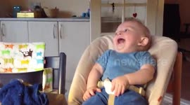 Kid laughing at dad