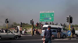 Land invaders in Cape Town block roads and burn tyres after informal structures are demolished