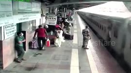 Security officer saves man from falling underneath moving train in western India