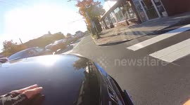RAW: Who is in the right? Driver cuts off cyclist but both say they had a green light