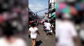 Shoppers ignore social distancing despite Covid-19 spike in the Philippines