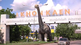 Dinosaur statue damaged in car crash has leg splint fitted in Thailand