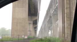 Torrential rain coming down highway