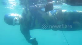 Eerie footage shows Slovakian freediver descend into murky abyss