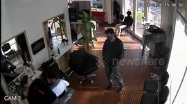 Man threatens barber with his son's toy gun in Argentina
