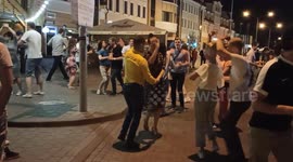 Salsa dancing on Zybitskaya street in the center of Minsk in the evening